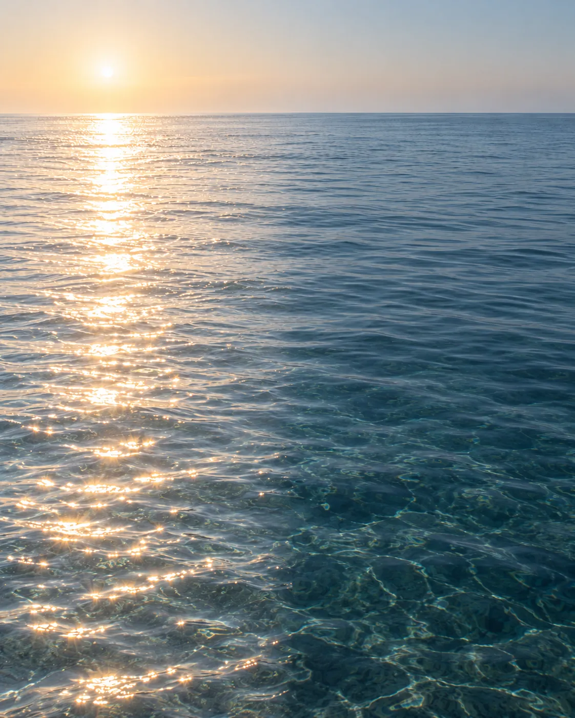 Sunlight on clear sea water